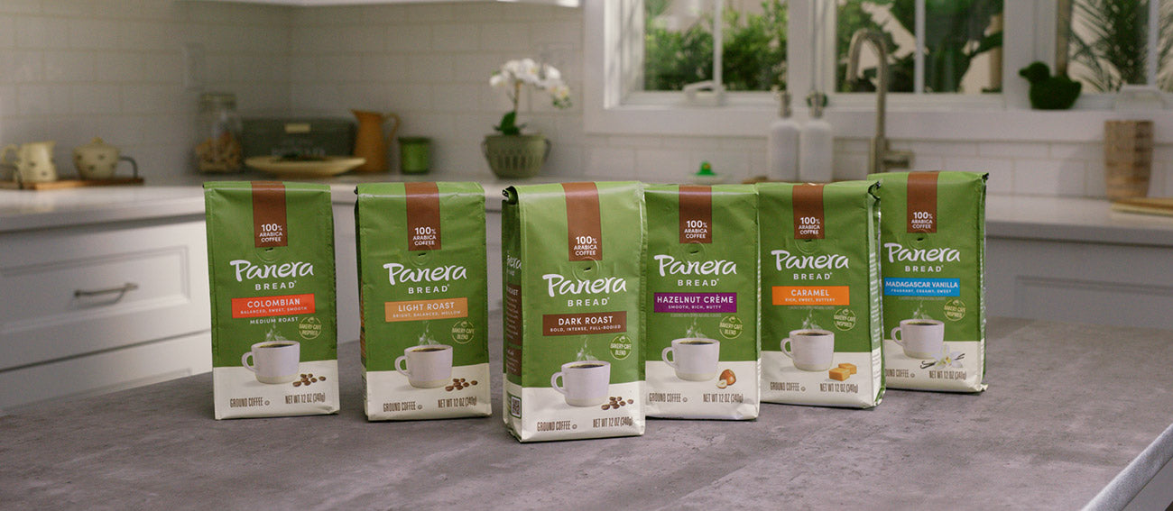 panera coffee ground bags lined up on table for mobile